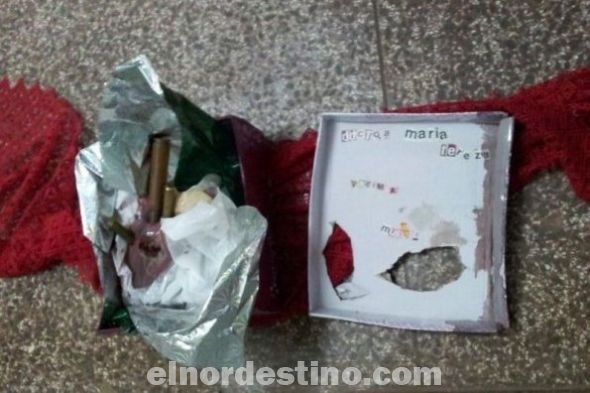 La caja con el corazón, los proyectiles y la amenaza contra María Teresa González. (Foto: Diario ABC Color).